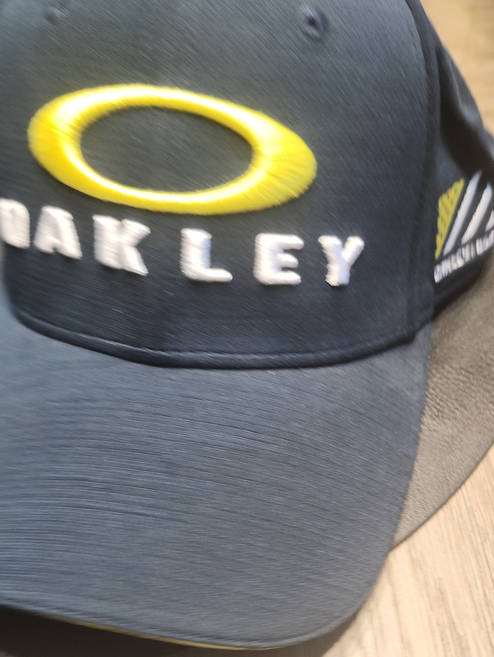 Oakley Black Cap with Yellow Logo